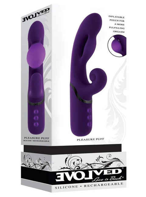 Purple silicone pleasure puff with packaging on a white background