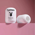 A white Playboy stroker toy shown in two pieces against a pink background. One piece is cylindrical with the black Playboy bunny logo and 'PLAYBOY EGG Stroker' text, and the other is a ribbed egg-shaped piece.
