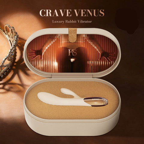 An open round presentation box containing a white rabbit-shaped vibrator with a clear cap, set against a warm brown background with text reading 'CRAVE VENUS' and a 'Made in Japan' badge.
