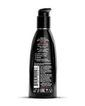 Black bottle with label on a white background