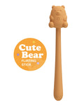 Cute bear-shaped flirting stick with a label on a white background