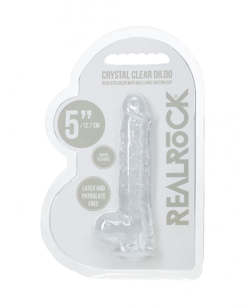 Clear dildo in packaging with 'Real Rock' branding on a white background