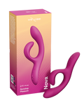 A pink and purple wavy silicone adult novelty massager shown next to its orange-to-pink gradient retail box on a plain white background. The box is branded 'woovibe' and labeled 'Nova'.