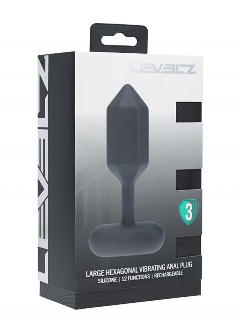 Revelz large hexagonal vibrating anal plug packaging on a white background