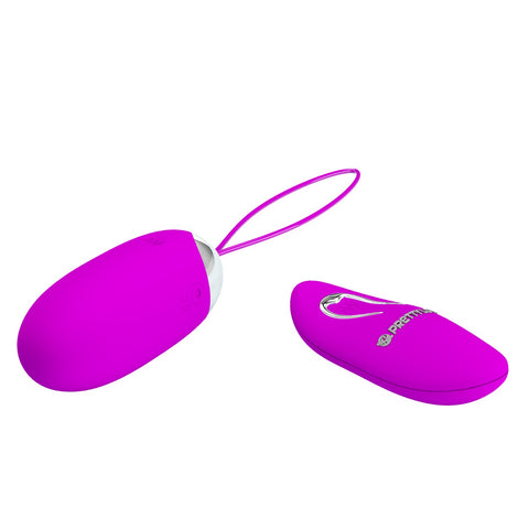 A bright magenta silicone personal massager shown disassembled into two pieces on a plain white background, with a matching wrist strap and a small printed logo on one piece.