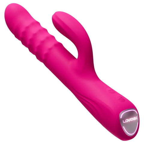 A bright pink personal massager with a textured shaft, curved clitoral stimulator arm, and a rounded handle featuring a circular LED light and the brand name 'LOVENSE' on a plain white background.