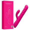 A bright pink personal massager shown next to its matching pink retail box on a plain white background. The box displays the brand name LOVENSE and the model name Velvo.