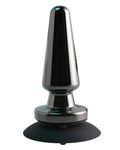 Black and silver device on a light blue surface with plants in the background