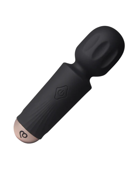 Black handheld massager with rose gold end on a white background