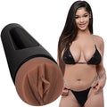 Black cylindrical product with brown textured bottom next to a woman in a black bikini.