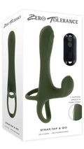 Green and white silicone device with packaging labeled 'Zero Tolerance' on a white background