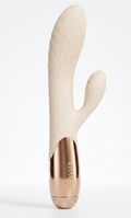 A cactus-shaped personal massager with a textured cream silicone body and a metallic rose gold base, standing upright on a light gray background.
