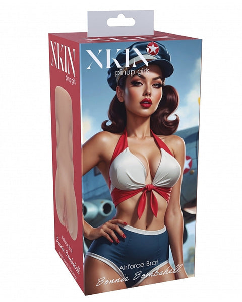 Boxed action figure of a superheroine with a red and white costume